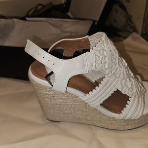 White crochet and leather wedges